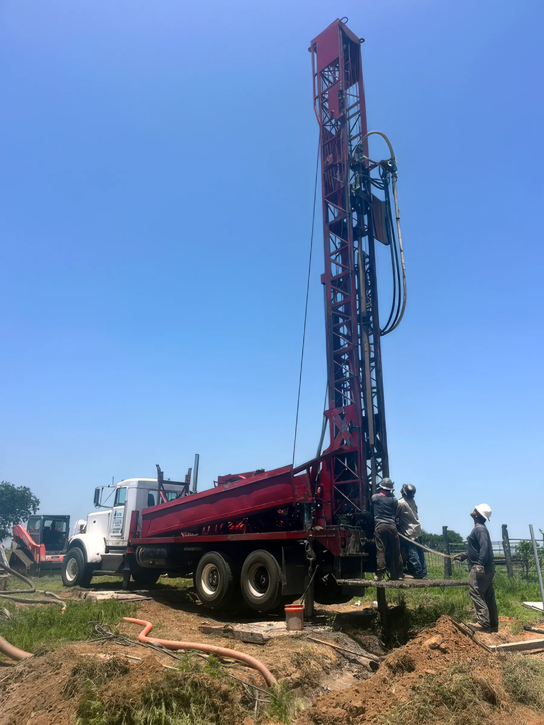 DFW Well Service water well drilling rig at work in Ellis County, Texas